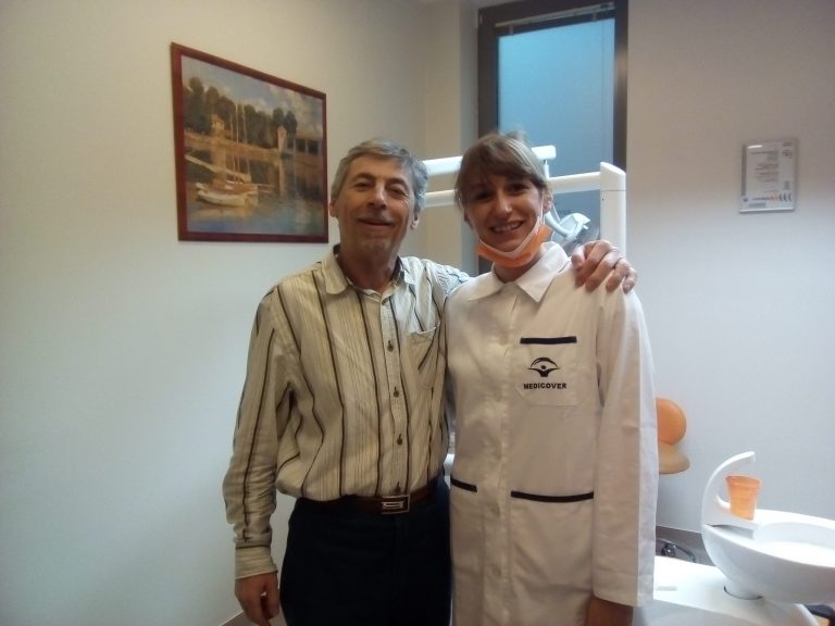 Dentist and satisfied patient Budapest Hungary