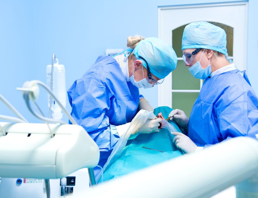 Dental implant surgery - the cost of full dentures with extractions - details in the post