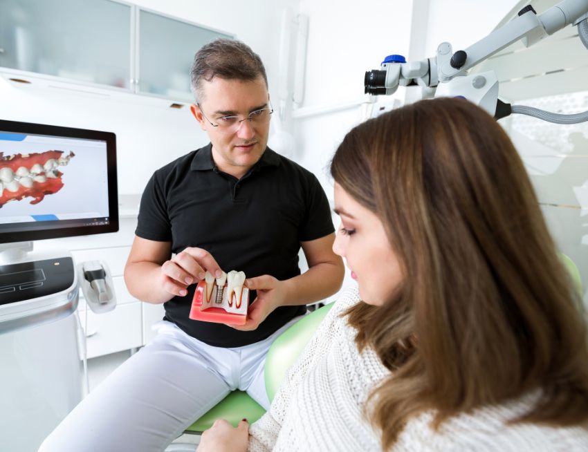 Dentist talking with patient